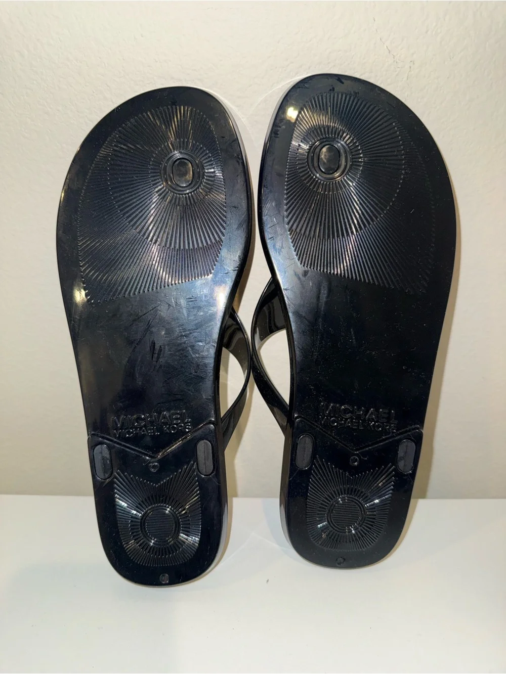 Michael Kors Black Jelly Thong Sandals with Gold MK Emblem